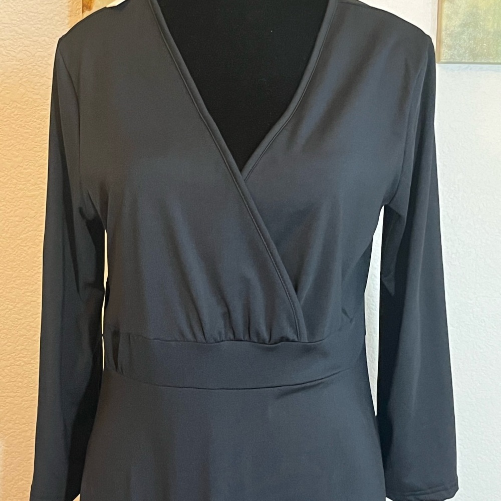 Poseshe women’s solid v neck. 95% polyester 5% spandex